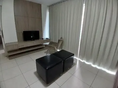 Uma televisão e/ou sistema de entretenimento em Studio Iracema by Escala Imoveis