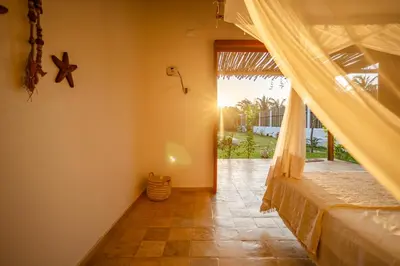 Uma cama ou camas num quarto em Villa Dodô Barrinha de baixo Prea Kite point com café da manha