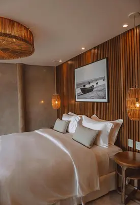 Uma cama ou camas num quarto em Yemanjá Hotel by Preabeach Experience