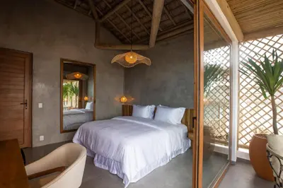 Uma cama ou camas num quarto em Yemanjá Hotel by Preabeach Experience