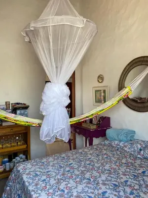 Uma cama ou camas num quarto em casa arandu