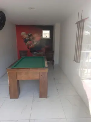 Uma mesa de bilhar em Apê Pertinho - Fortaleza, Ceará!