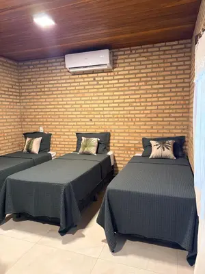 Uma cama ou camas num quarto em Casa Barra Nova