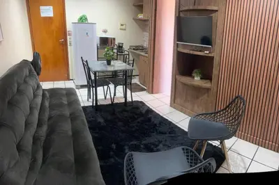 Uma área de estar em Flat Mobiliado na Beira Mar