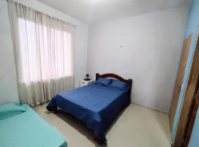 Uma cama ou camas num quarto em Casa da Serra Mulungu CE