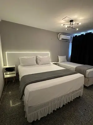 Uma cama ou camas num quarto em 205 Atlântico Residence Vista Mar