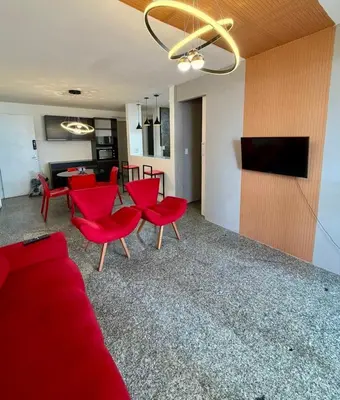 Uma televisão e/ou sistema de entretenimento em 205 Atlântico Residence Vista Mar