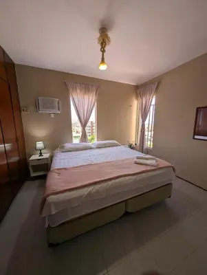 Uma cama ou camas num quarto em Cobertura Praia do Futuro