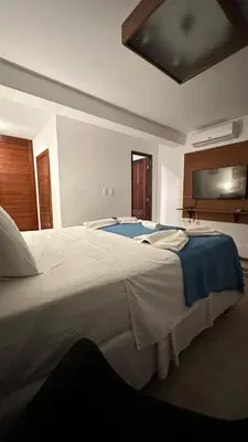 Uma cama ou camas num quarto em Villa Biju