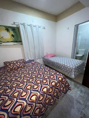 Uma cama ou camas num quarto em Nativa casa principal