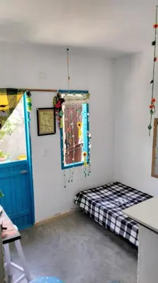 Uma cama ou camas num quarto em Casa Compartilhada - Shared house