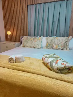 Uma cama ou camas num quarto em Aconchego do João - praia do Preá