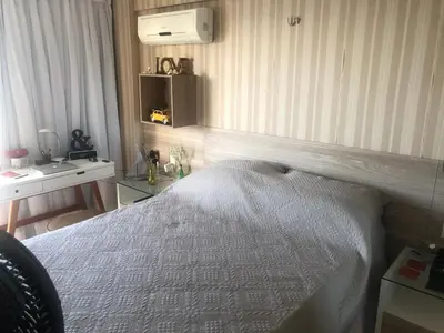 Uma cama ou camas num quarto em Apartamento Iracema Fortaleza