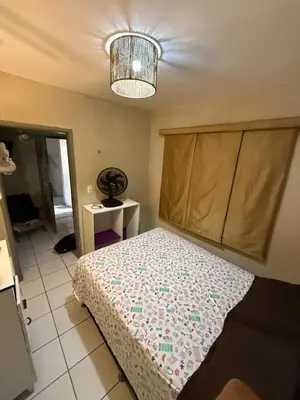 Uma cama ou camas num quarto em Apartamento mobiliado com dois quartos para locação fixo e mensal