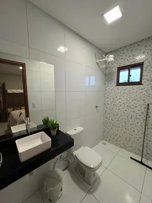 Uma casa de banho em Casa Iparaí - Chácara de águas cristalina