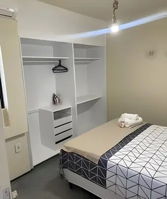 Uma cama ou camas num quarto em Atlântico Bela vista para o Mar