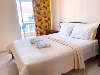 Uma cama ou camas num quarto em Planet Pé na Areia PDD