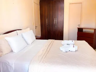 Uma cama ou camas num quarto em Planet Pé na Areia PDD