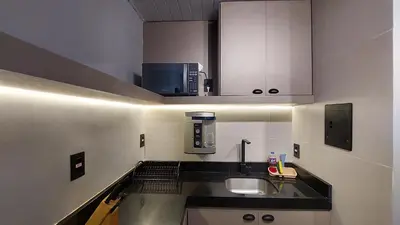 A cozinha ou kitchenette de Apartamento em Porto das Dunas - Próximo ao Beach Park