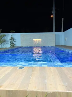 A piscina em ou perto de Casa Praiana pé na areia Morro Branco