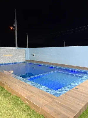 A piscina em ou perto de Casa Praiana pé na areia Morro Branco
