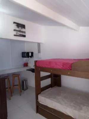 Uma cama ou camas num quarto em suite completa na cobertura no prea ce