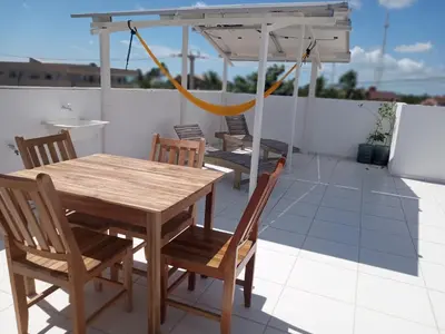 Uma varanda ou terraço em suite completa na cobertura no prea ce