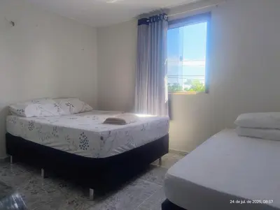 Uma cama ou camas num quarto em hostel xamã