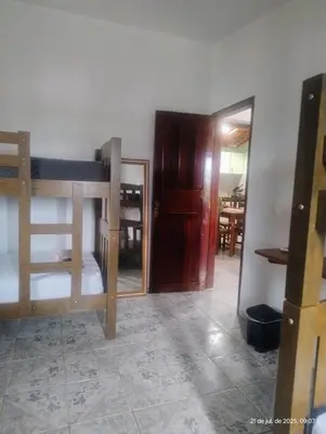 Uma cama ou camas num quarto em hostel xamã