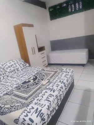 Uma cama ou camas num quarto em hostel xamã