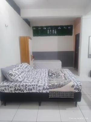 Uma cama ou camas num quarto em hostel xamã