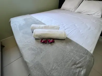 Uma cama ou camas num quarto em Terramaris - Paraíso Pé na areia