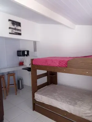 Uma cama ou camas num quarto em Cobertura solariun com 2 suites na praia do prea