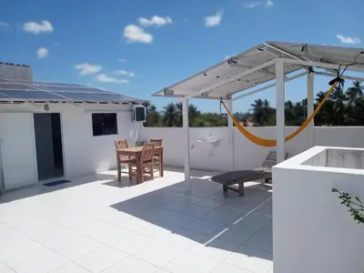 Uma varanda ou terraço em Cobertura solariun com 2 suites na praia do prea