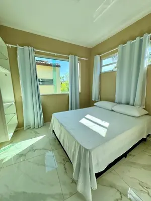 Uma cama ou camas num quarto em Casa flecheiras aconchego