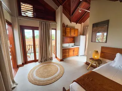 Uma cama ou camas num quarto em Villa Maracujá