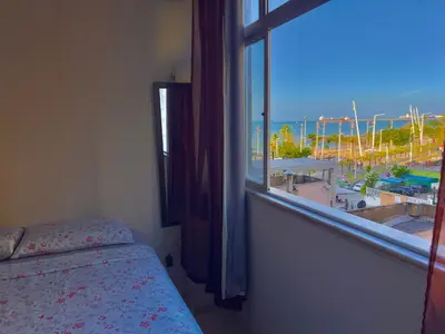 Uma cama ou camas num quarto em Flat Brisa do Mar