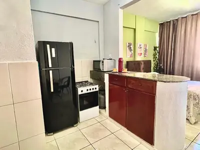A cozinha ou kitchenette de Flat Brisa do Mar