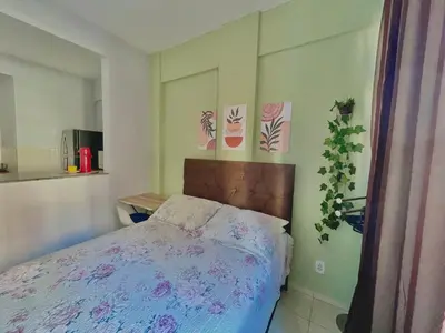 Uma cama ou camas num quarto em Flat Brisa do Mar