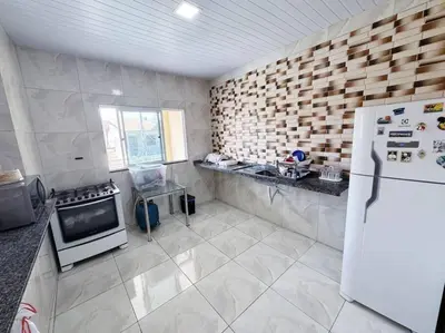 A cozinha ou kitchenette de Apartamento em Mundaú