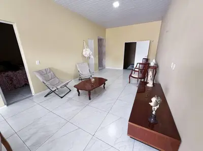 Uma área de estar em Apartamento em Mundaú