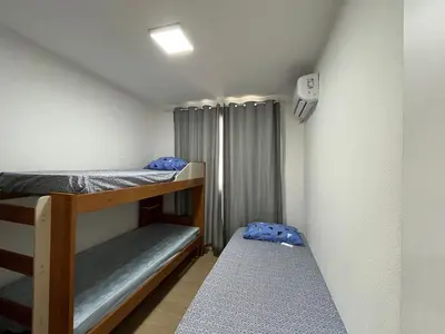 Uma cama ou camas num quarto em Mirante Clube - Praia do Futuro II