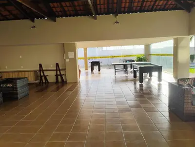 Um restaurante ou outro lugar para comer em Flat 500 MTS do Beach park
