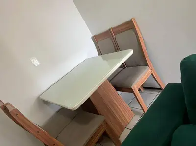 Uma área de estar em Apart Próx à Beira Mar