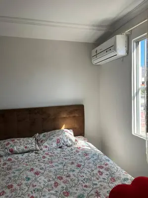 Uma cama ou camas num quarto em Apart Próx à Beira Mar