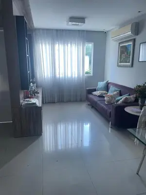 Uma área de estar em Casa Condomínio Eusébio Amador