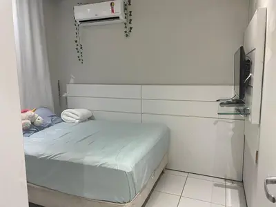 Uma cama ou camas num quarto em Casa Condomínio Eusébio Amador