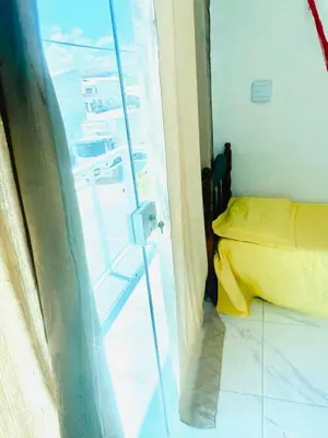 Uma área de estar em Apartamento Dunas