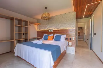 Uma cama ou camas num quarto em Summerville #117 - Luxo no Cumbuco by Carpediem