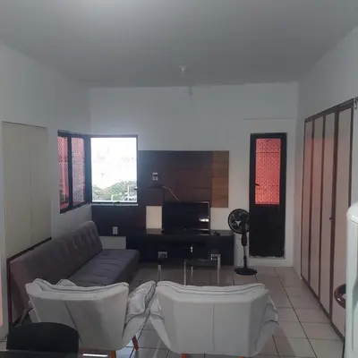 Uma área de estar em Costeira Mar
